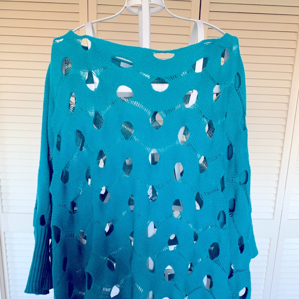A beautiful turquoise Sweater